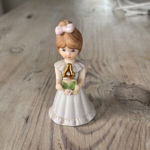 Porcelain Girl Figurine with Bow
